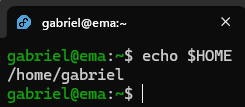 Terminal do Fedora, em que se executa o comando "echo $HOME". A resposta é "/home/gabriel".